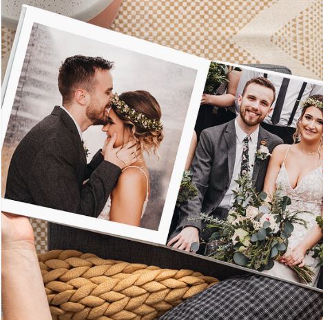 a wedding photo album with photo's a bride and groom in it